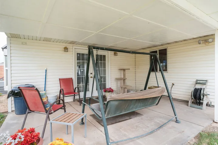 Covered patio with concrete flooring and direct outdoor access