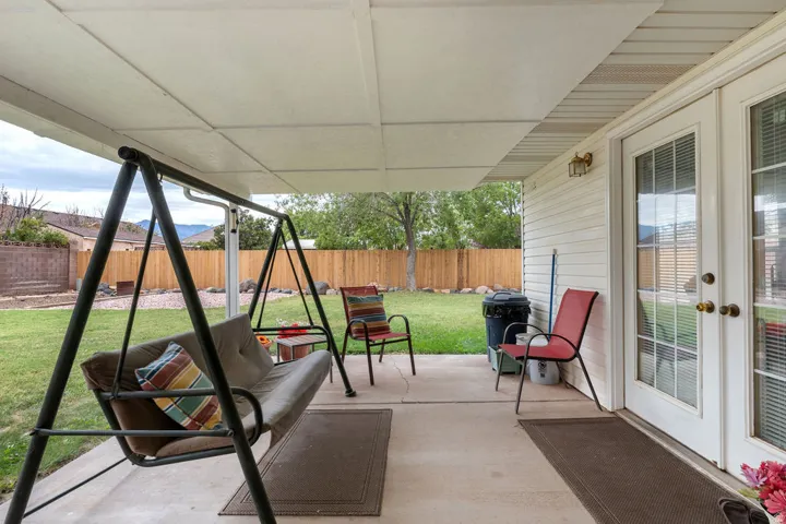 Covered patio with a concrete surface