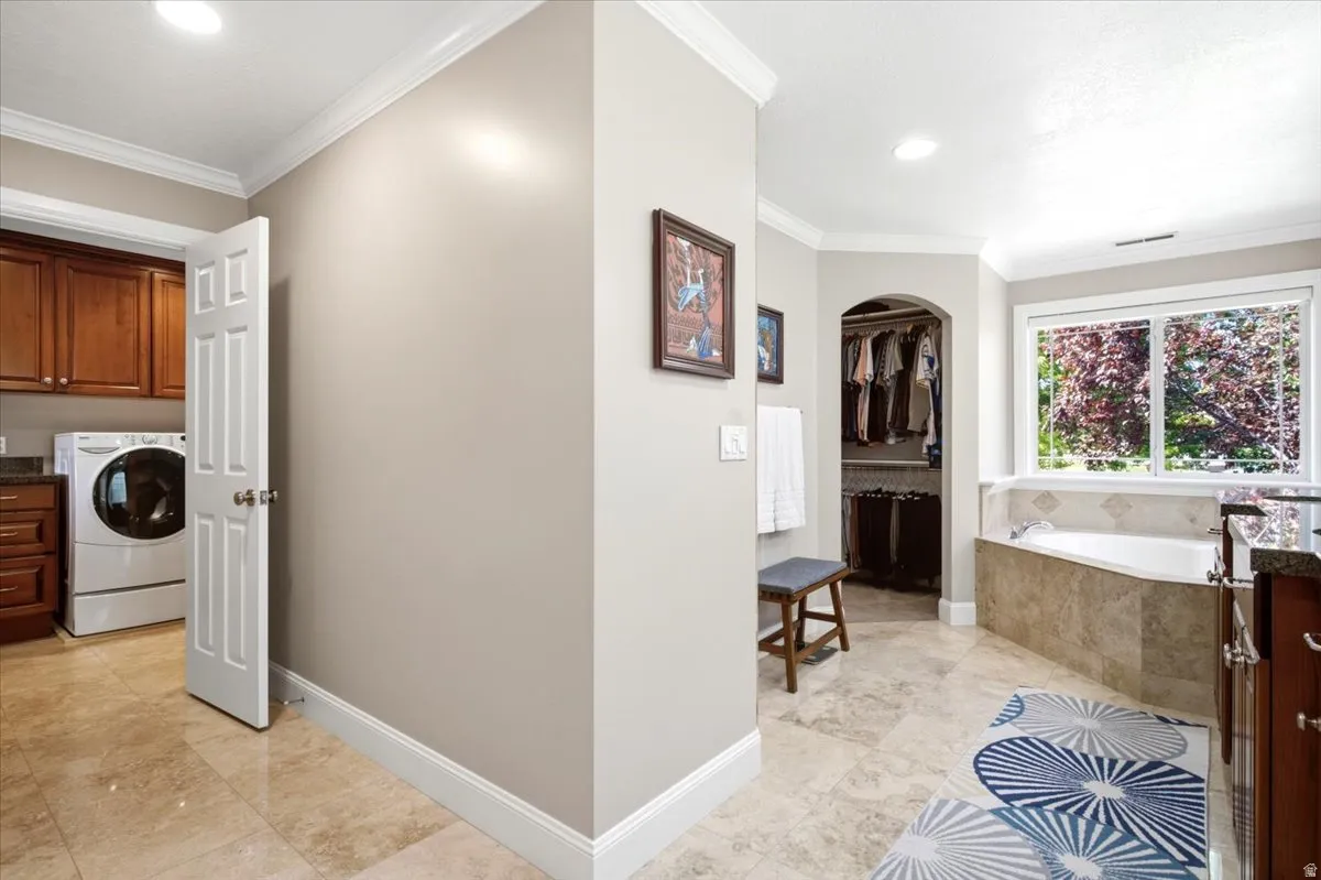 Large format tile flooring extending through the space