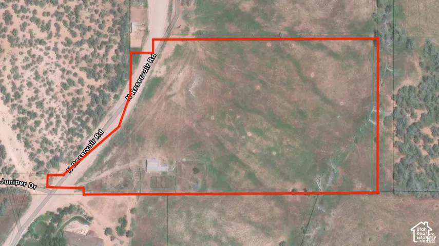 Aerial Map. Presenting the boundary of the property with surrounding roads and terrain