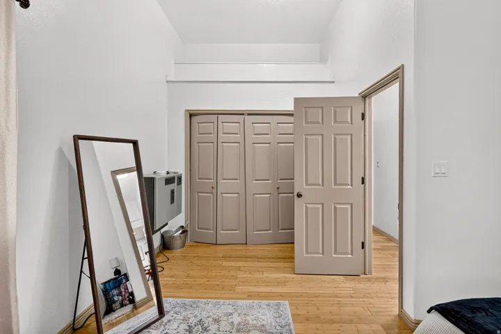 Hardwood-style flooring throughout with neutral wall tones