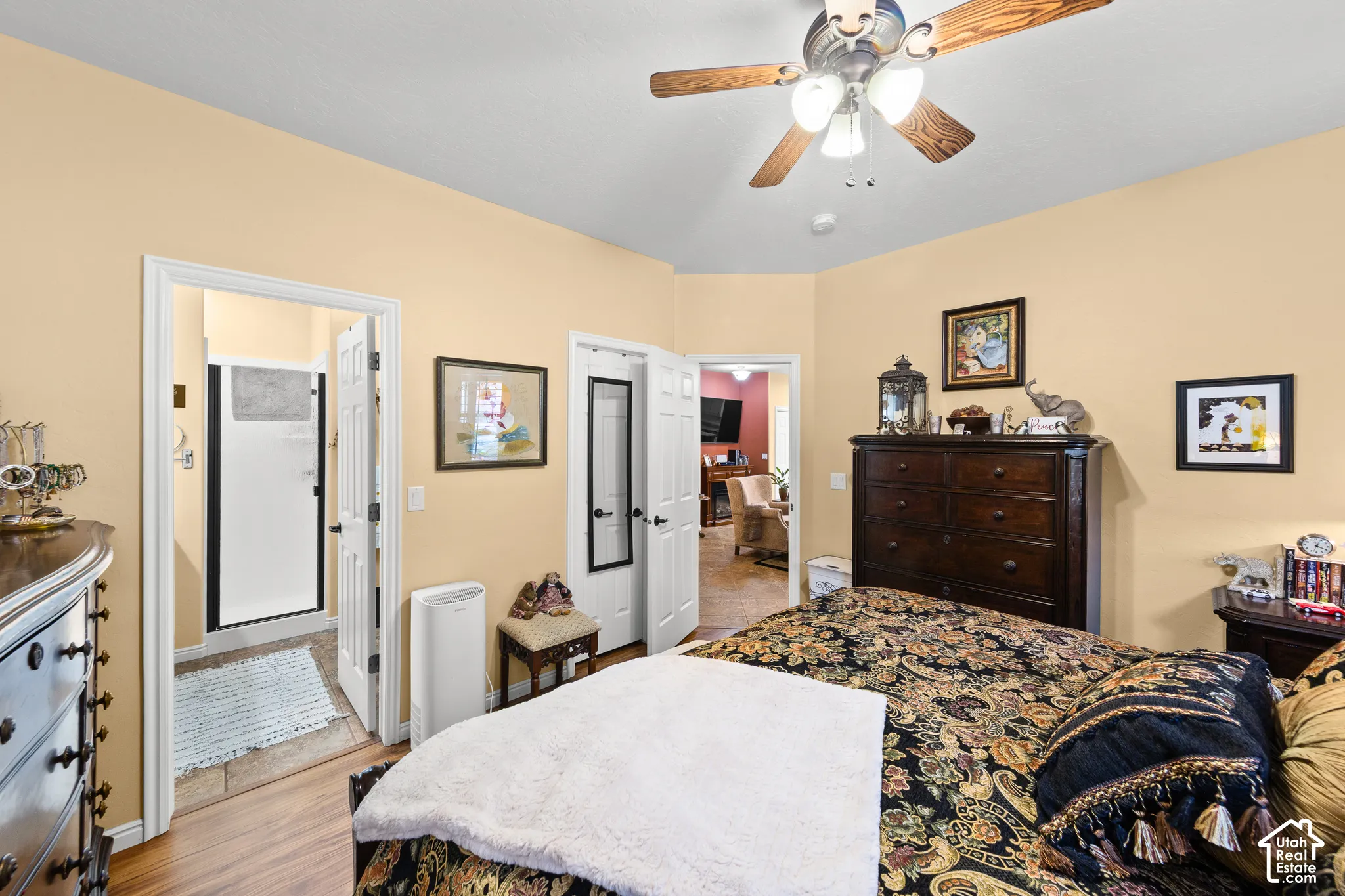 Wood-finish flooring with an overhead ceiling fan
