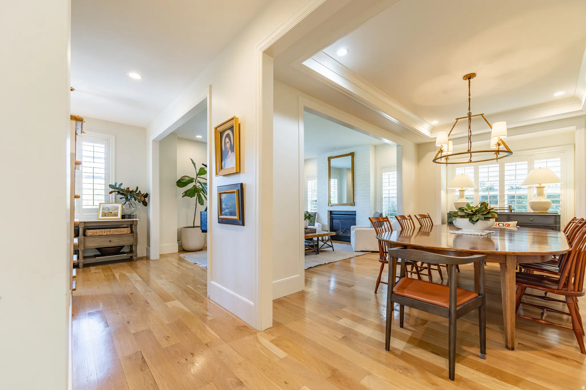 Hardwood flooring throughout, recessed lighting, crown molding, and plantation shutters