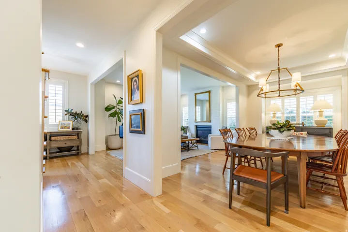 Hardwood flooring throughout, recessed lighting, crown molding, and plantation shutters
