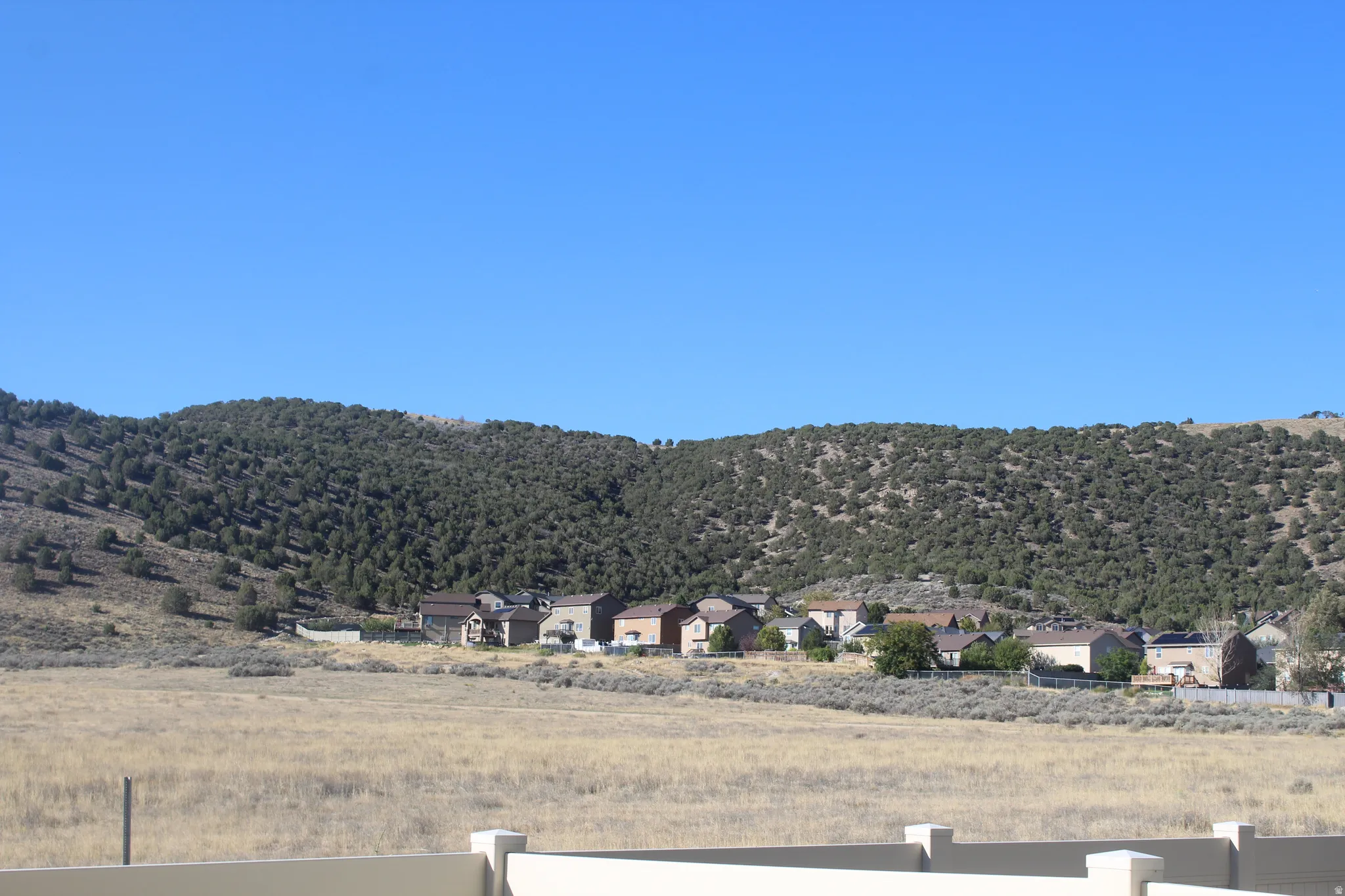 Expansive natural landscape with a clear blue sky