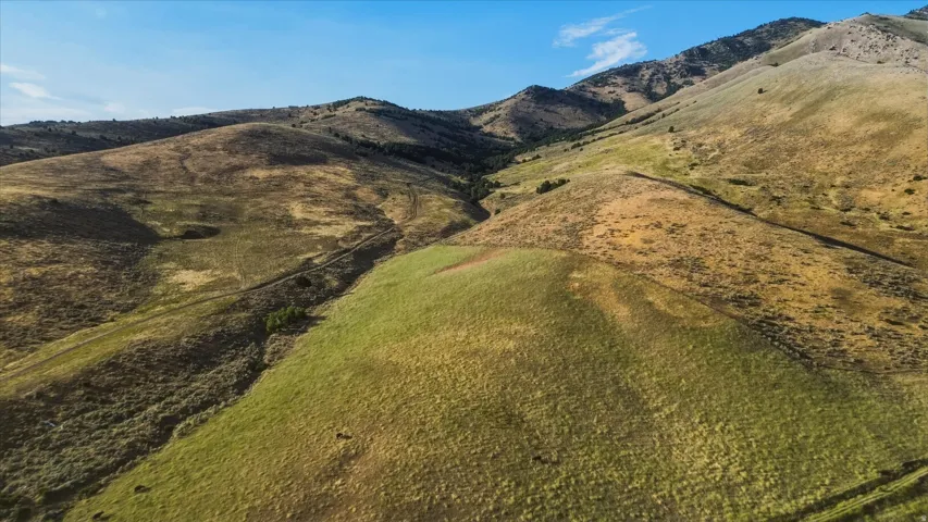 Mountain landscape featuring natural terrain and varied vegetation