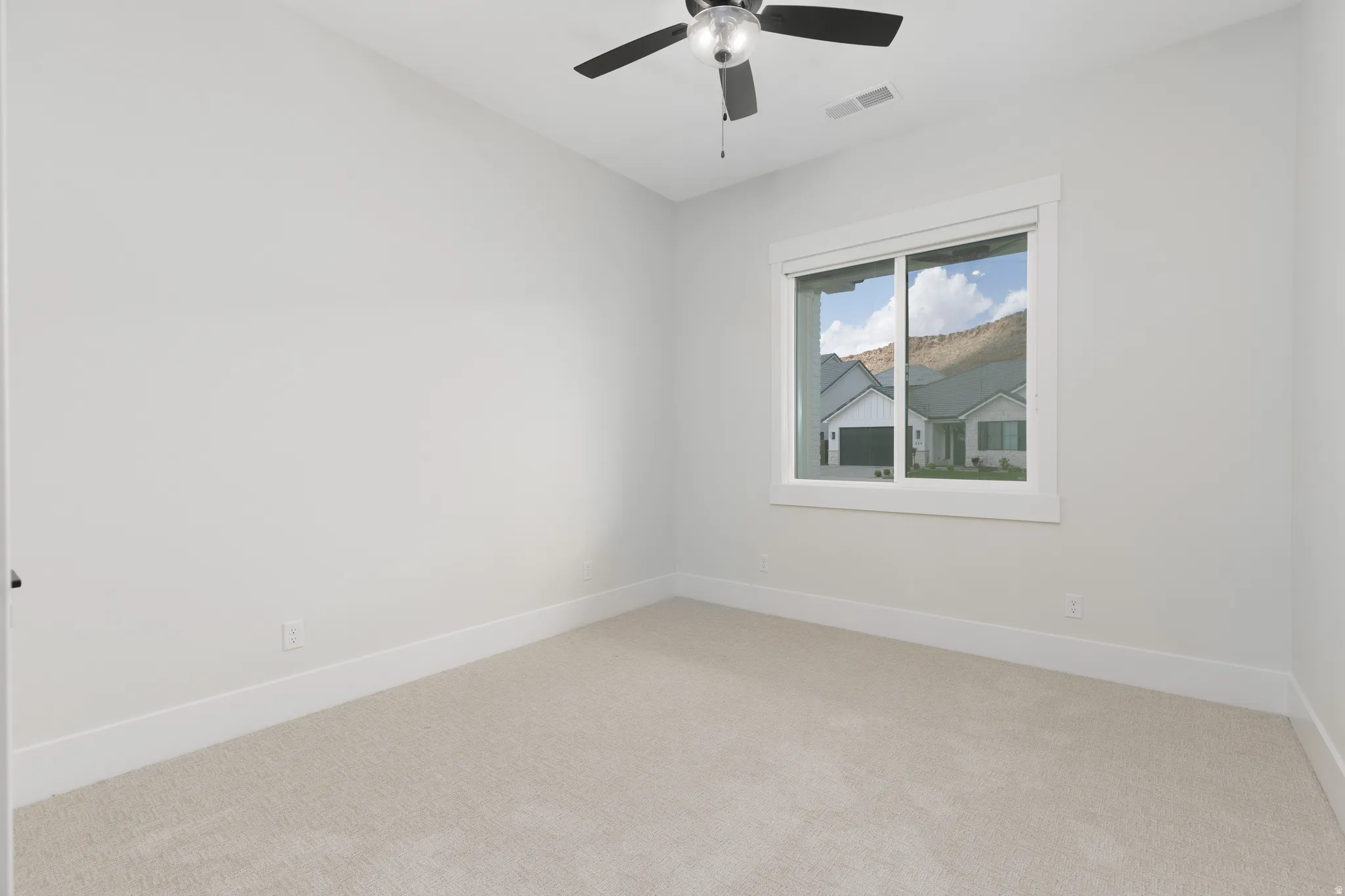 Light-toned walls with coordinating carpet