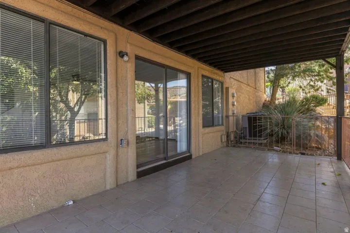 Covered patio featuring tiled flooring