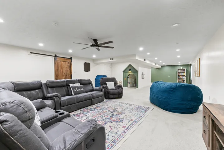 Recessed lighting and ceiling fan overhead