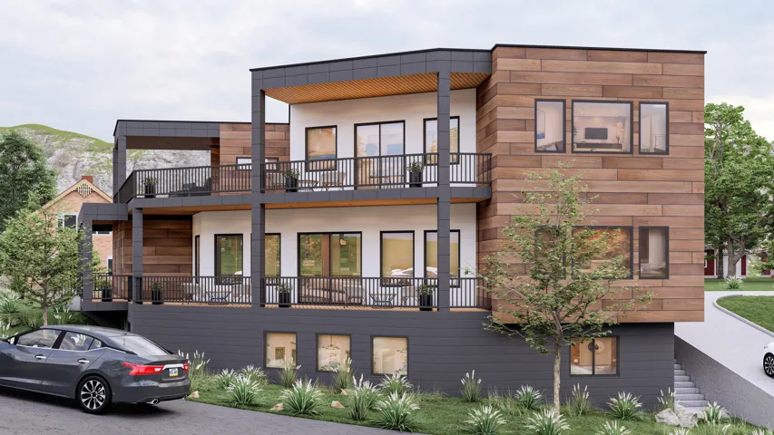 Modern architecture featuring a wood-finish facade, multiple balconies with dark railings, a white and dark gray exterior, and varied window placements