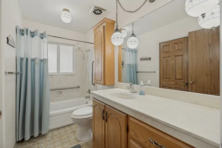 Upstairs Bath, with pocket door to Main Bedroom