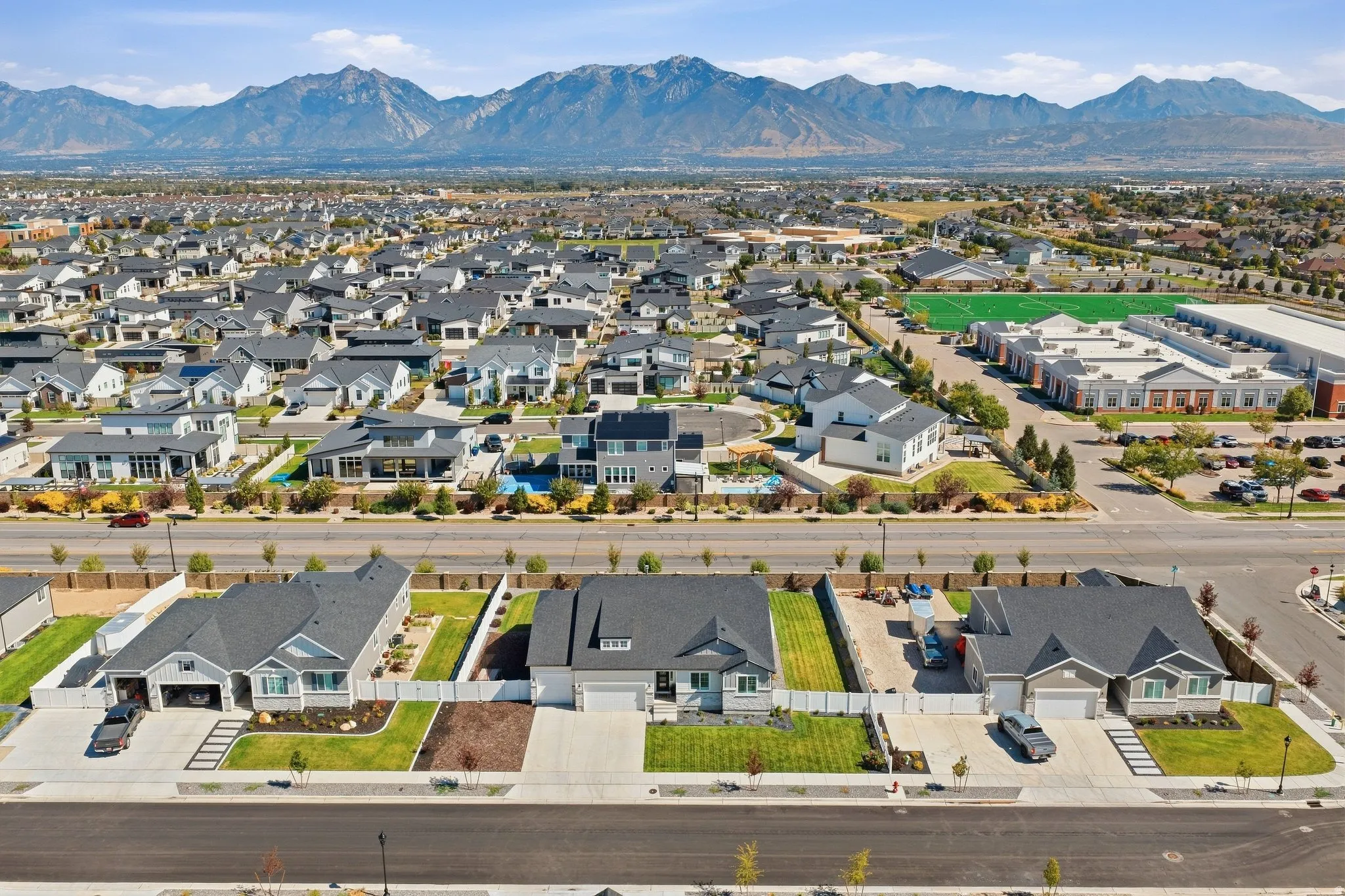 Expansive community with mountain backdrop.