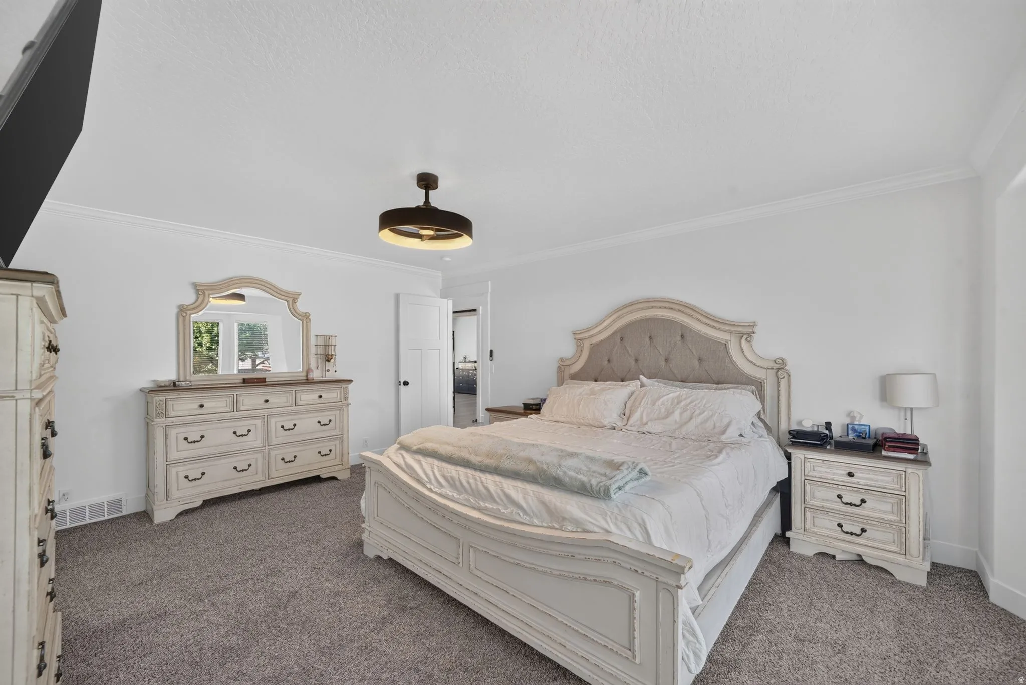 Recessed lighting with a ceiling fan, crown molding, and neutral wall color