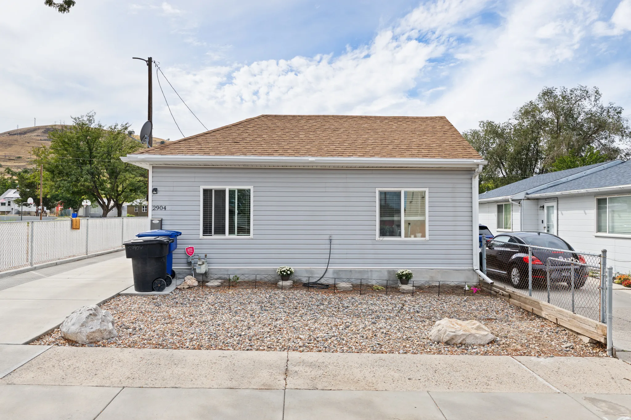 Xeriscaped Front Yard. Fully Fenced Side and Back Yards