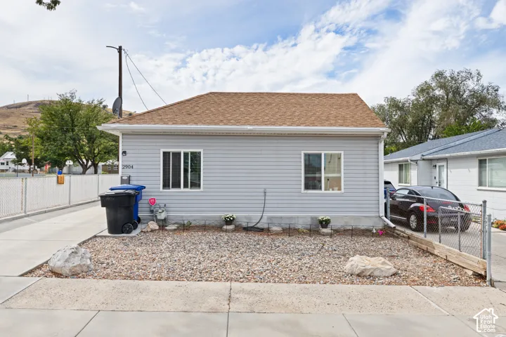 Xeriscaped Front Yard. Fully Fenced Side and Back Yards
