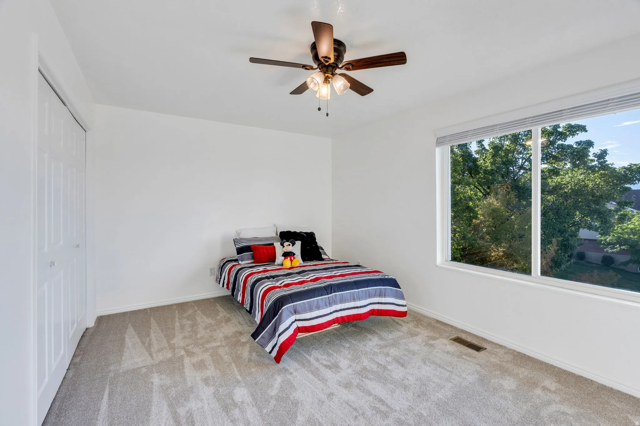 Large Bedroom #4 with new carpet and fresh paint