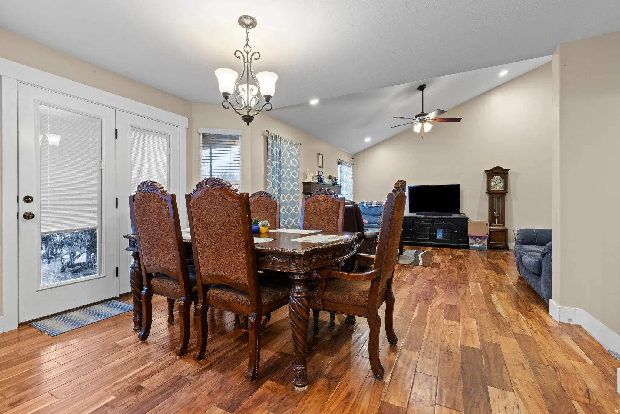 Wood-finish flooring throughout with a door to the deck.