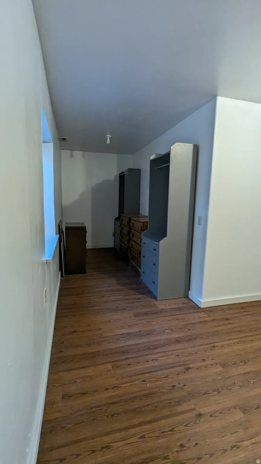 Wood-finish flooring throughout