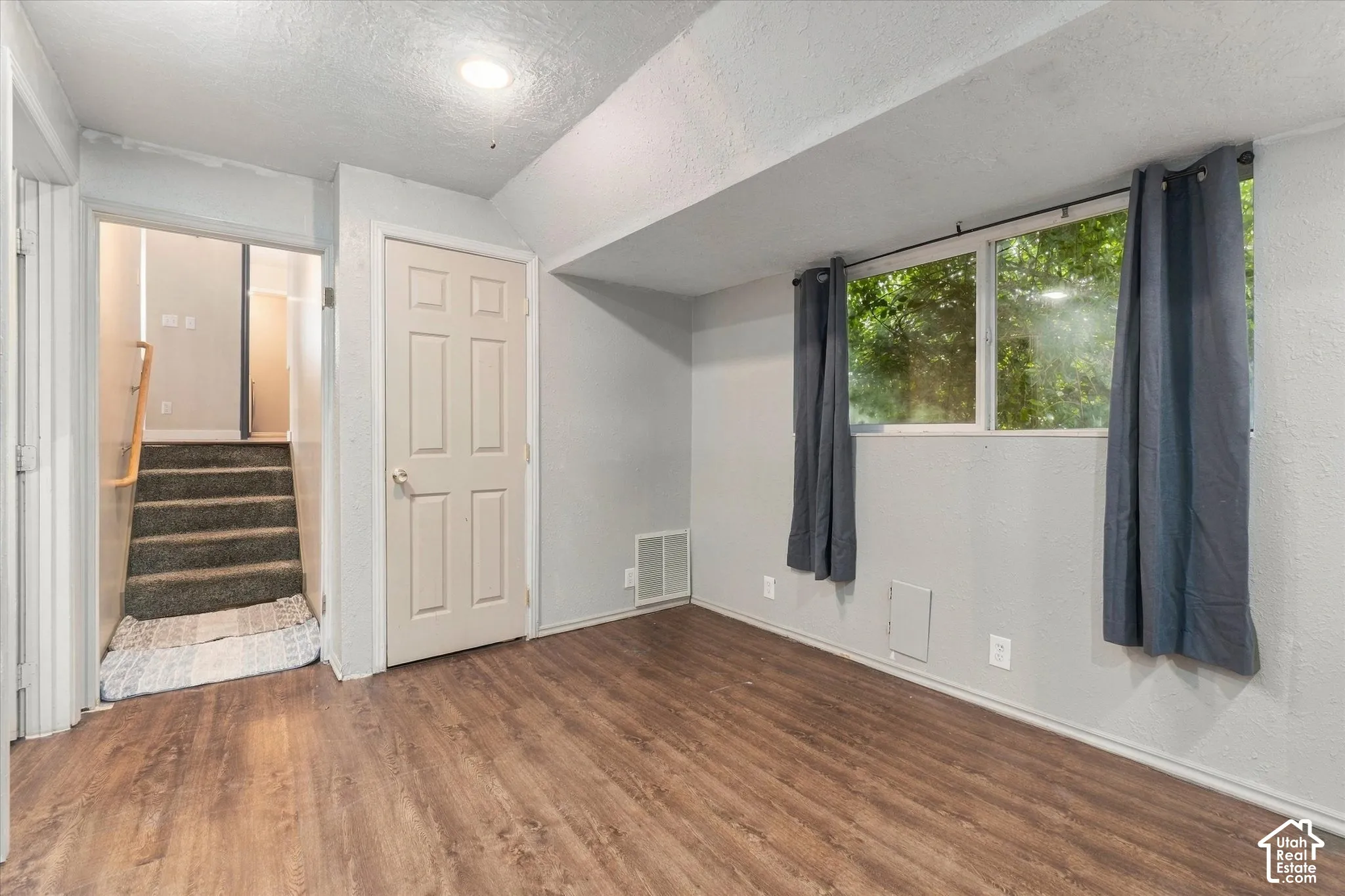 Wood-finish flooring with a neutral wall color