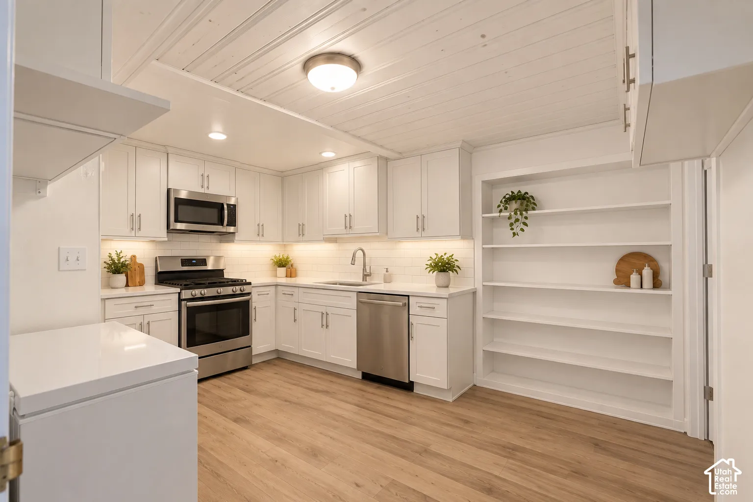 Digitally altered to see what the basement kitchen could look like