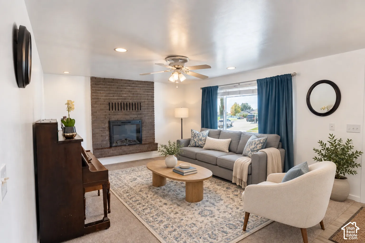 Digitally staged with area rug, table, chair, and pillows