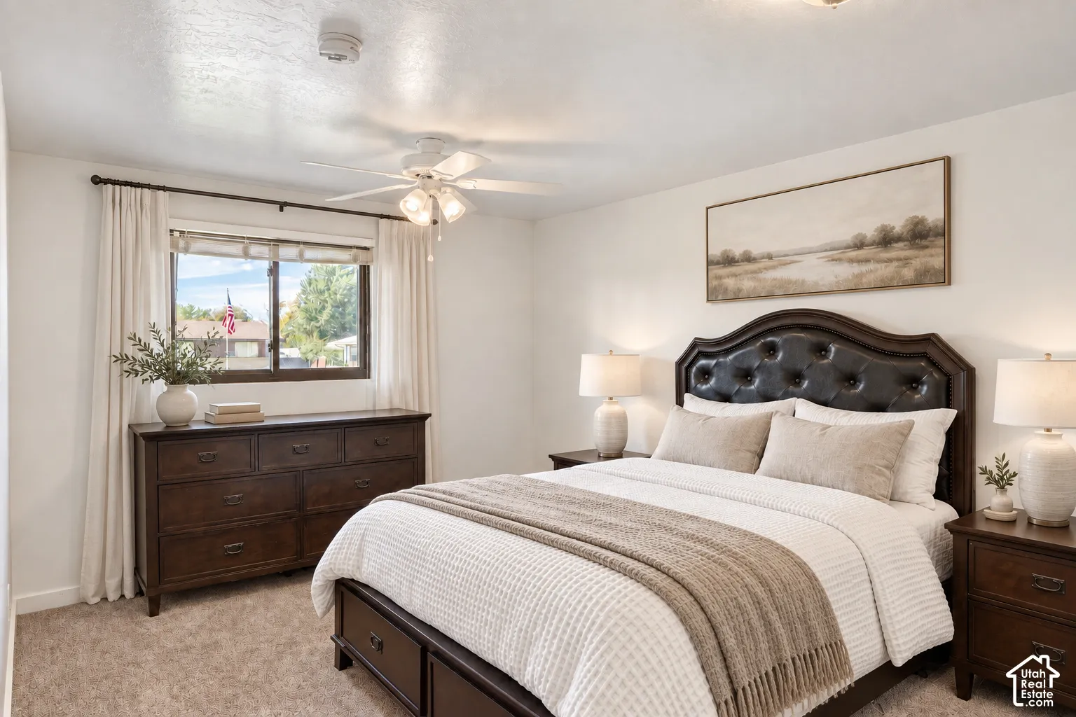 Digitally staged with accessories, bed and dressers are there