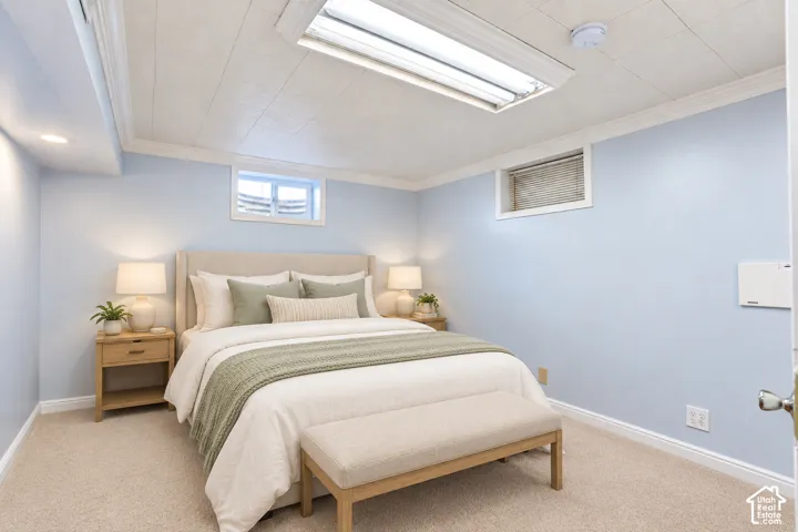 Recessed lighting, carpeted flooring, overhead lighting, and two windows