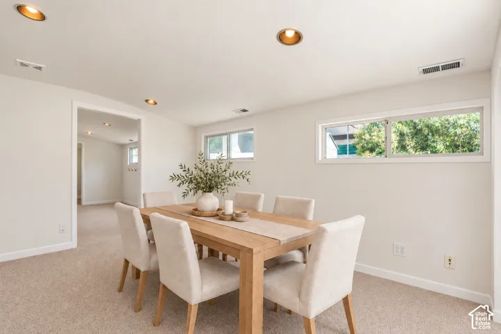 Potential dining, office, flex room digitally staged
