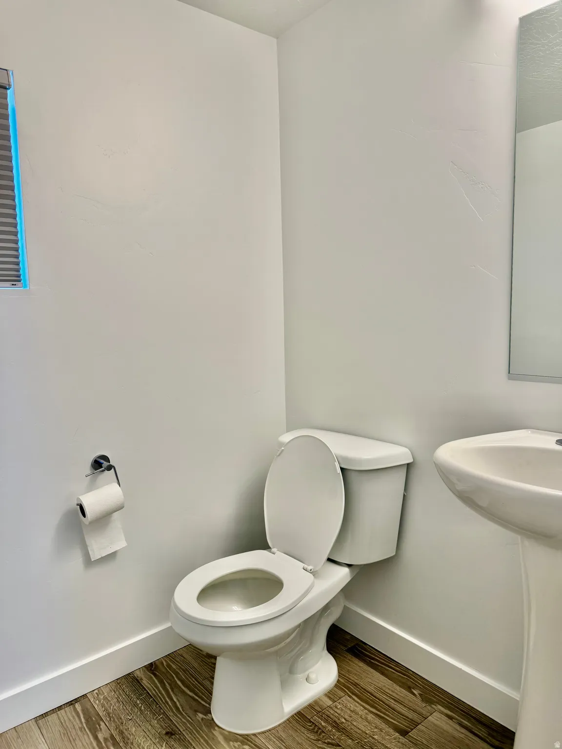 Neutral color palette with wood-finish flooring