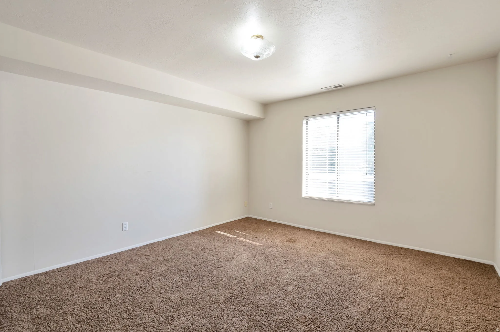 Bedroom with Large Window