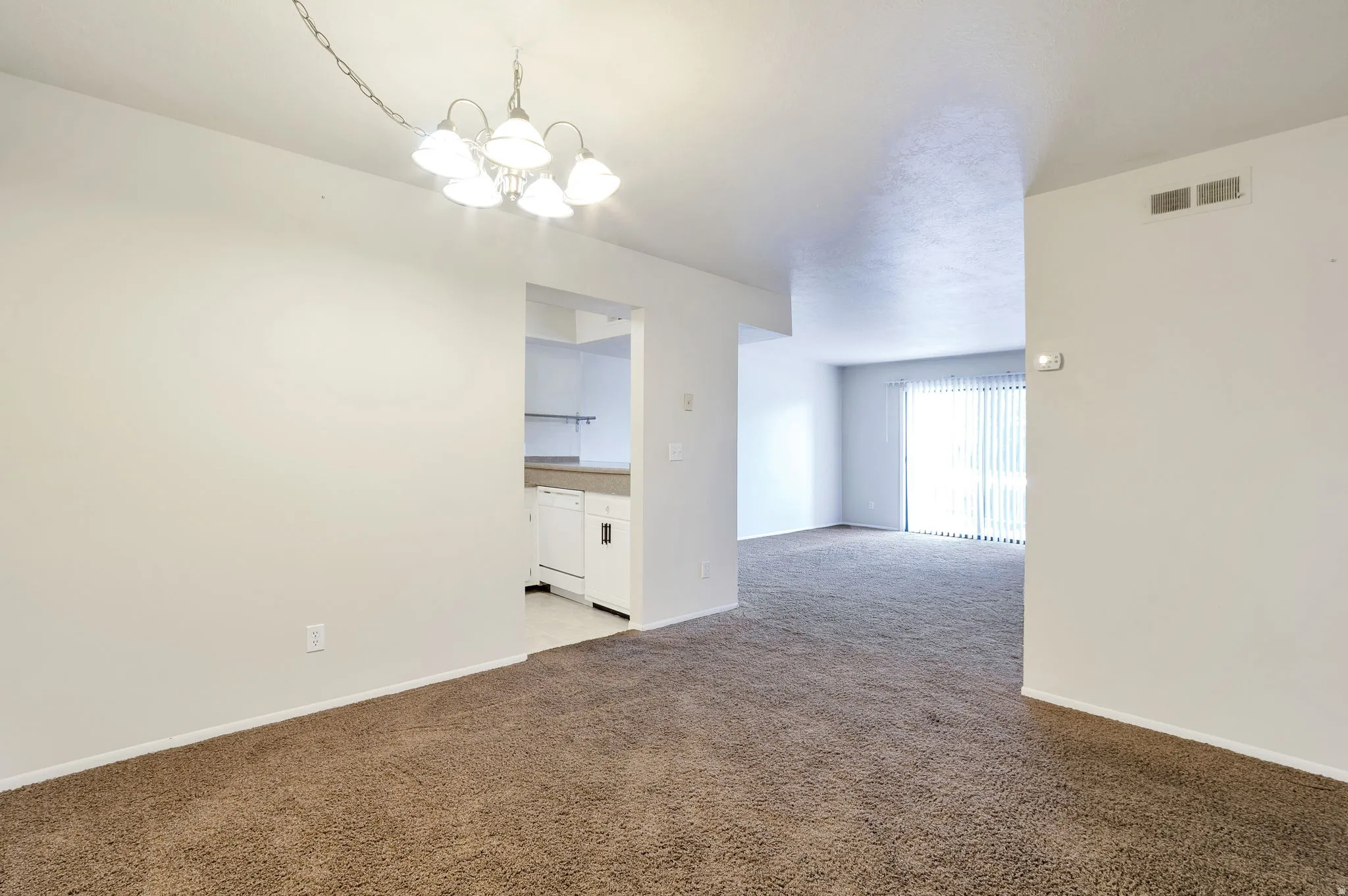 Dining Room Looking Into Living Room and Kitchen