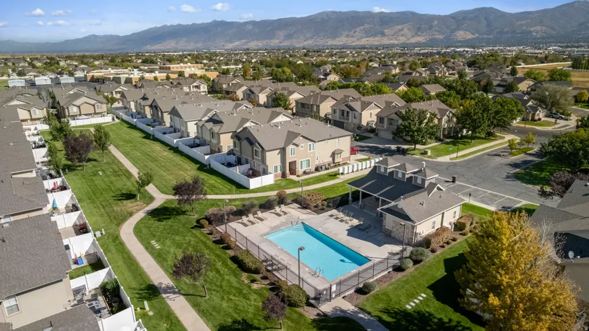 Community swimming pool with adjacent clubhouse building