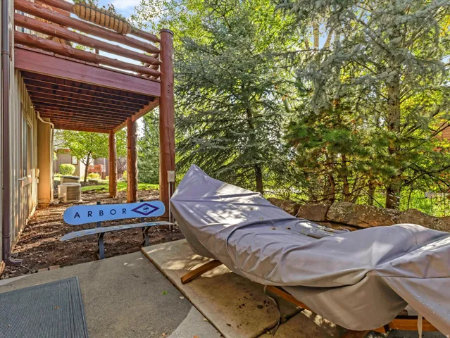 Covered patio area featuring a concrete slab