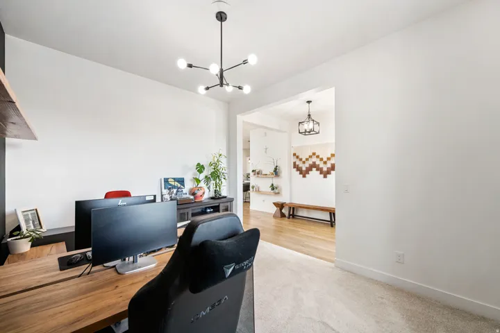 Recessed doorway with a modern black chandelier