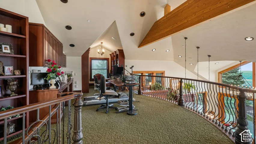 Floating Office Loft with hand-forged decorative iron and custom milled shelving and cabinetry