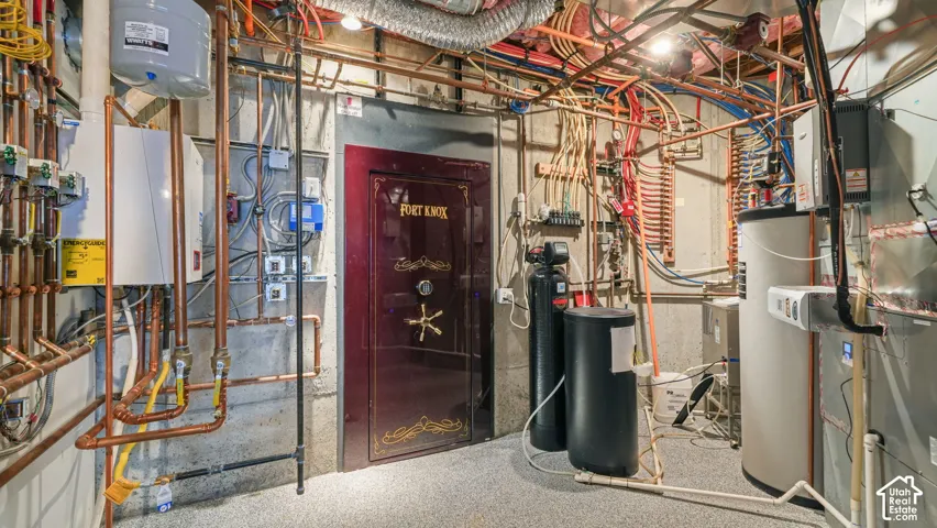 Fort Knox Vaulted Panic Room and Utility room with multiple water heaters and new copper piping