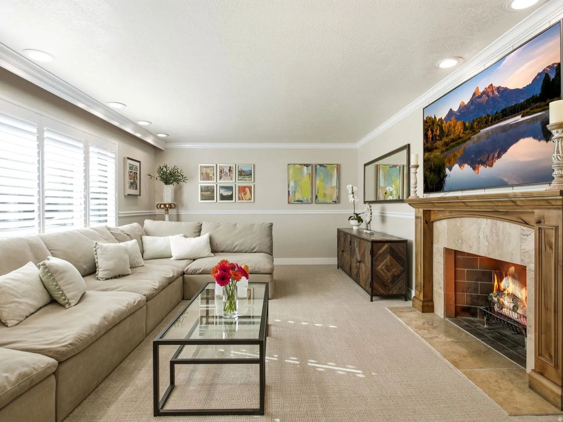 Spacious living room with fireplace and included Frame tv.