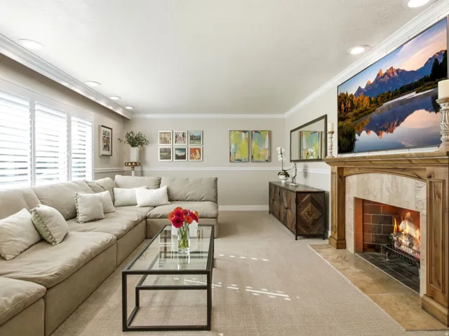 Spacious living room with fireplace and included Frame tv.