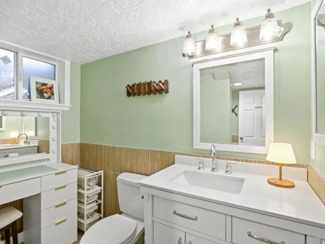 Large vanity area in full bathroom