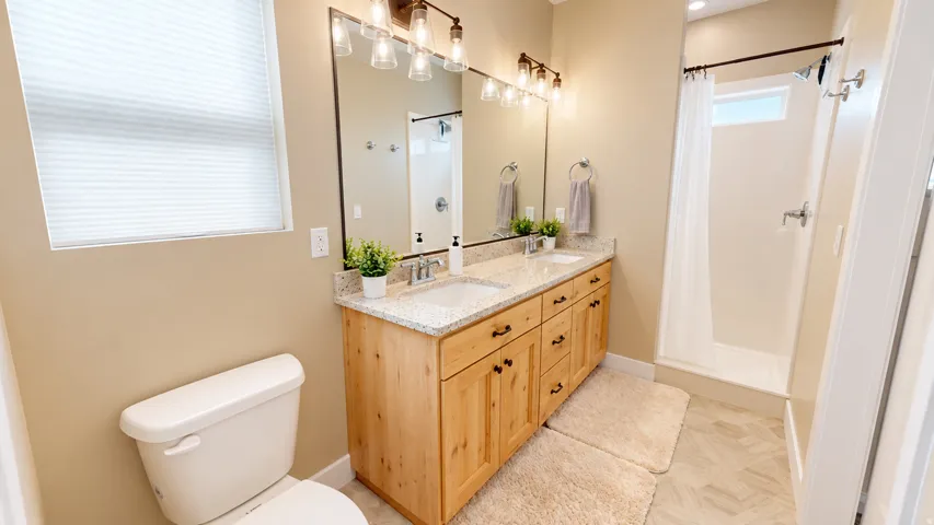 Dual vanity with granite countertop and undermount sinks