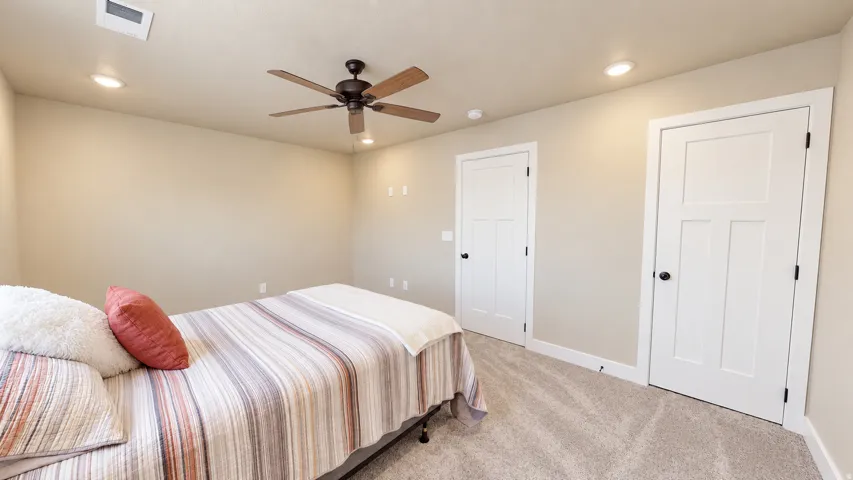Neutral tone walls with recessed lighting