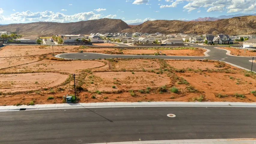 Developed residential lots with paved roads and concrete sidewalks
