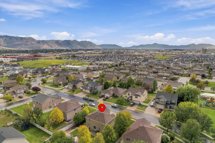 Expansive residential neighborhood with distant mountain ranges