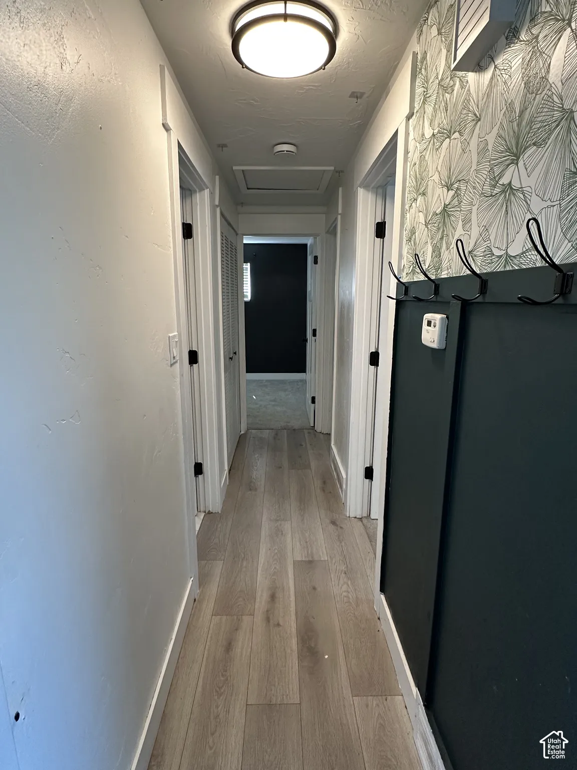 Wood-finish flooring with crisp white trim