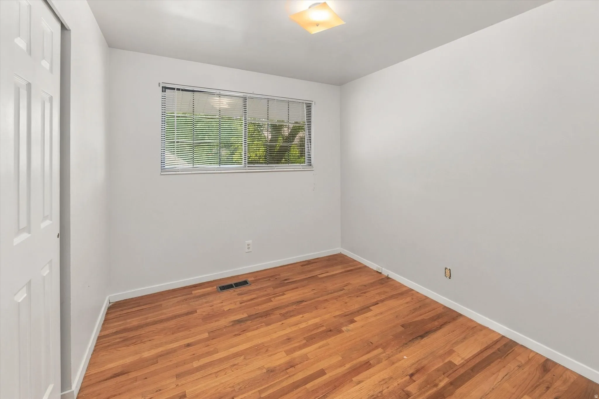 Bedroom with wood floor
