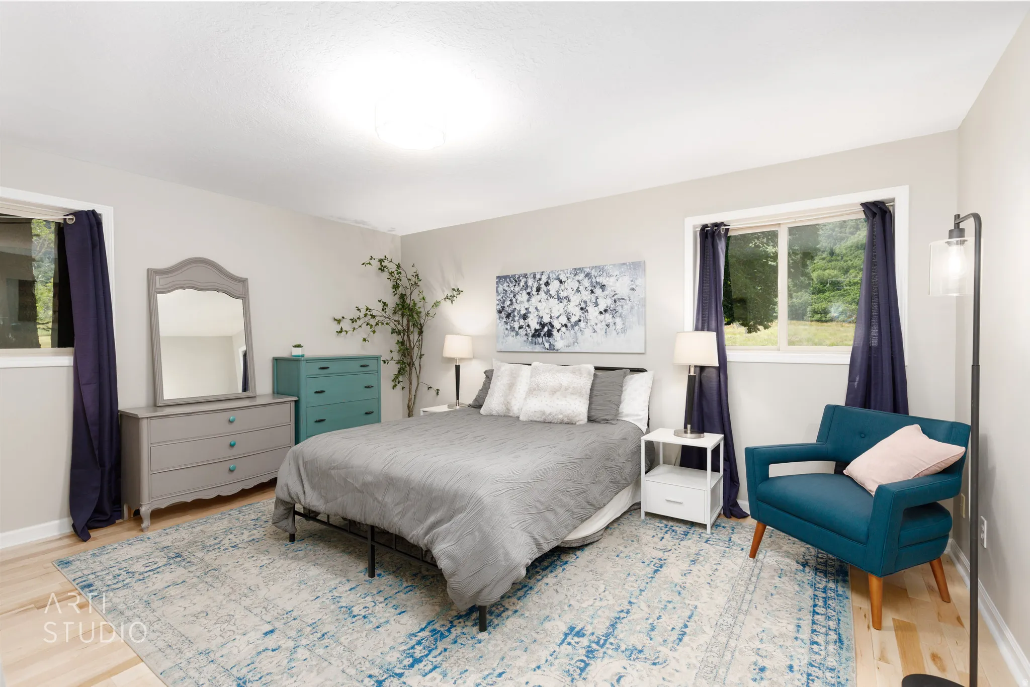 Light wood-finish flooring with neutral wall paint throughout