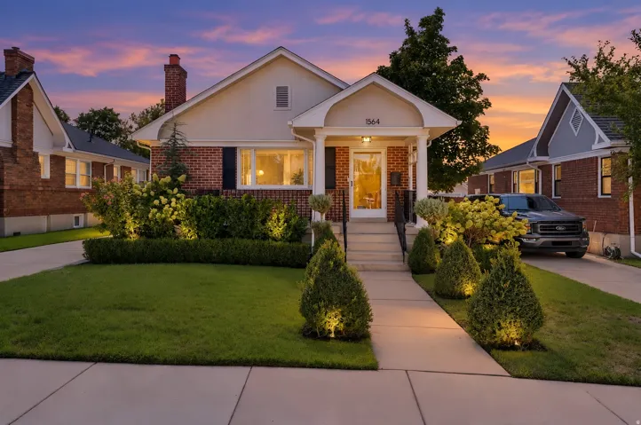 Brick and siding exterior with a covered front porch