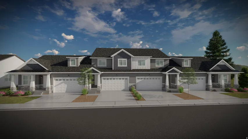 Modern multi-unit residence with a dark gray exterior, white trim, and stone accents