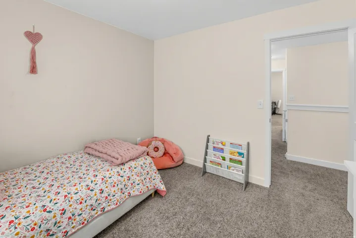 Neutral wall color, carpeted flooring, and white trim