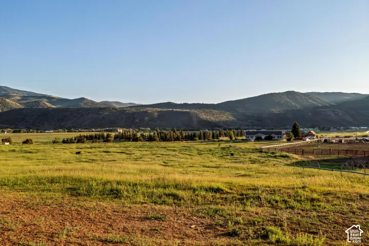 Expansive rural acreage with lush green fields